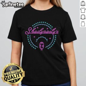 Afro singer performing at Nice Shadynasty Jazz Club with a retro microphone, featured on a stylish ladies tee.