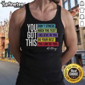 Teacher wearing 'Rock The Test' tank top on testing day, inspiring students with positive vibes and motivation.