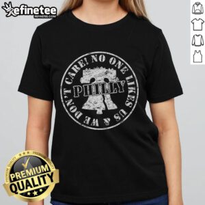 Vintage Philadelphia ladies tee with 'No One Likes Us, We Dont Care' slogan, perfect for casual wear and sports fans.