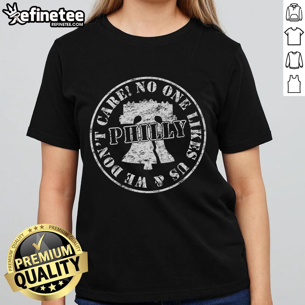 Vintage Philadelphia ladies tee with 'No One Likes Us, We Dont Care' slogan, perfect for casual wear and sports fans.