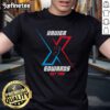Xavier Edwards wearing a stylish t-shirt featuring his name, showcasing his unique fashion sense and personality.