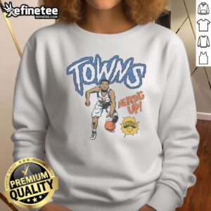 Official New York Knicks comic book sweatshirt featuring Karl Anthony Towns in vibrant team colors and graphics.