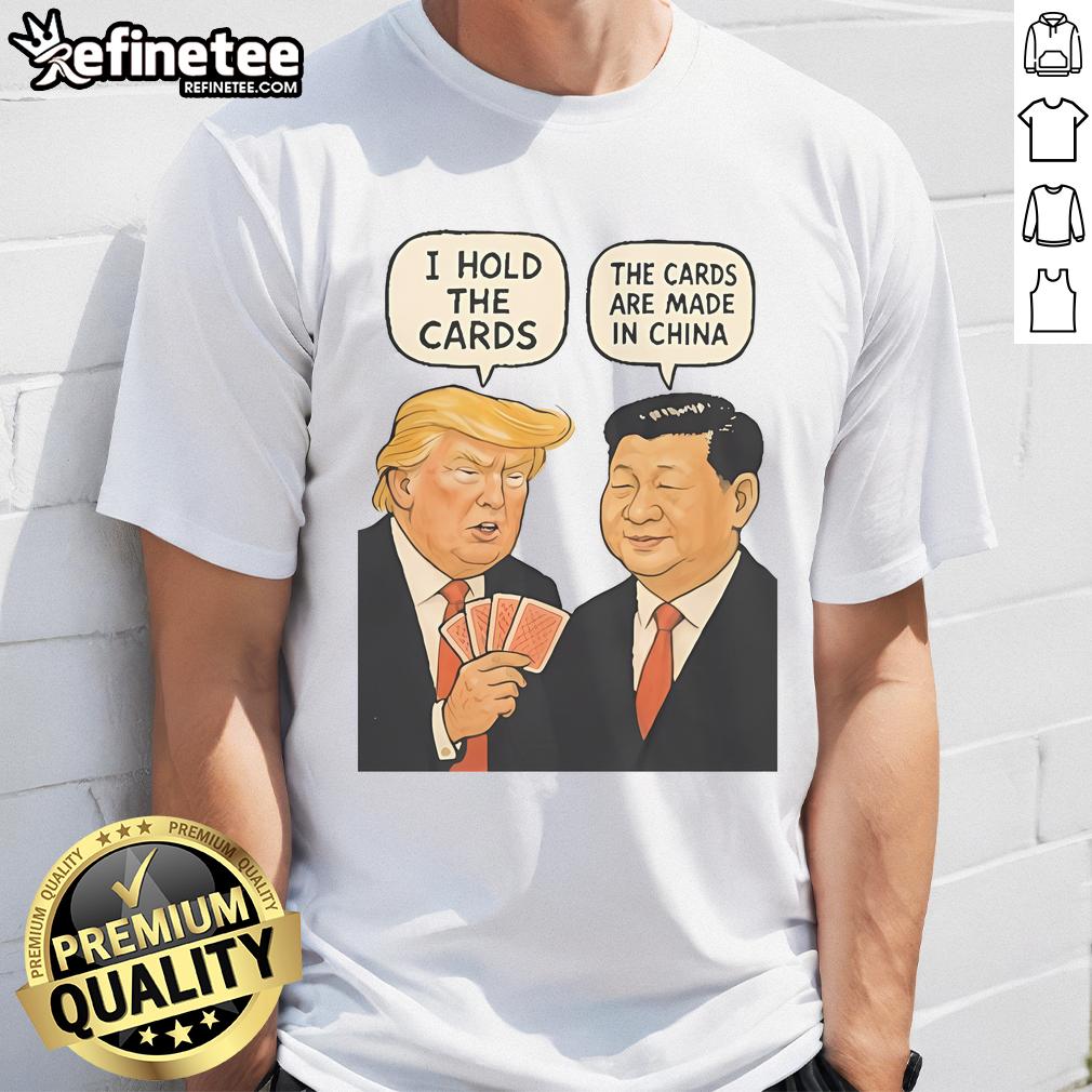Alt Text: Official Trump I Hold The Cards T-Shirt featuring 'The Cards Are Made In China' slogan in bold print.