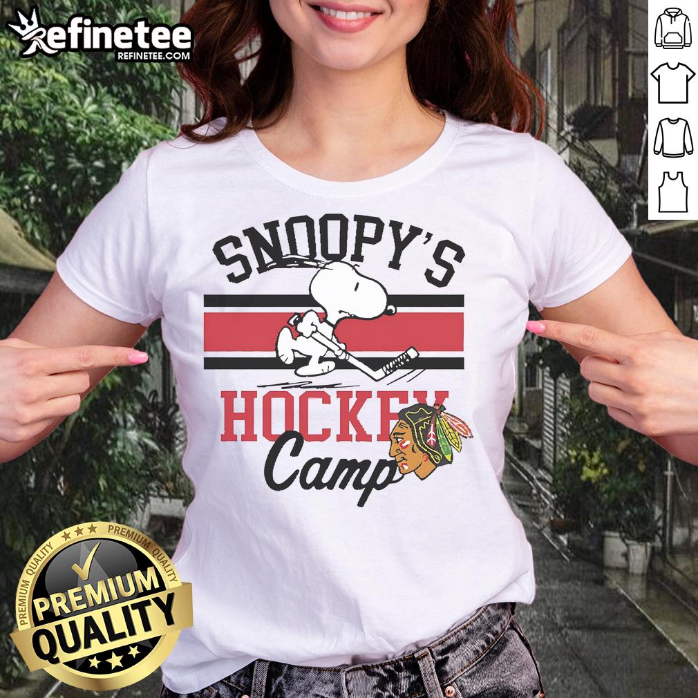 Alt Text: Cute Snoopy Chicago Blackhawks tee for ladies featuring Snoopy in a sporty design, perfect for game day wear.