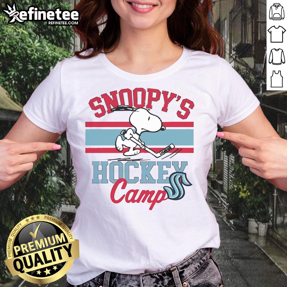 Cute Snoopy in Seattle Kraken gear at Snoopy's Hockey Camp, featuring NHL teams on a ladies tee shirt.