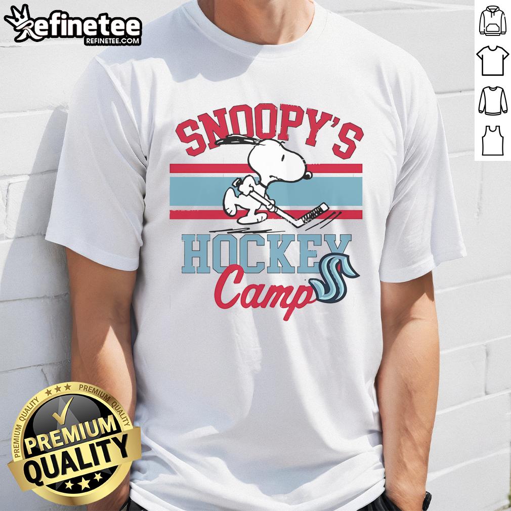 Alt Text: Cute Snoopy Seattle Kraken T-Shirt featuring Snoopy at Hockey Camp, celebrating NHL teams with a fun design.