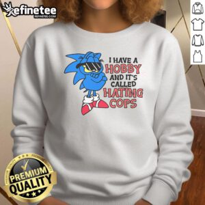 Funny Garfield and Sonic sweatshirt featuring the phrase 'I Have A Hobby Called Hating Cops' in bold graphic design.