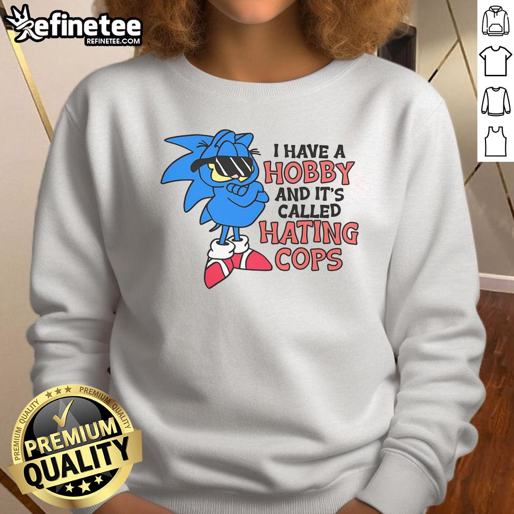 Funny Garfield and Sonic sweatshirt featuring the phrase 'I Have A Hobby Called Hating Cops' in bold graphic design.