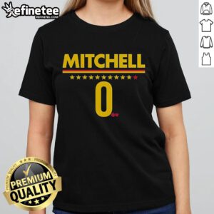 Alt Text: Kelsey Mitchell wearing a stylish Indiana Fever ladies tee, showcasing team spirit and fashion in vibrant colors.