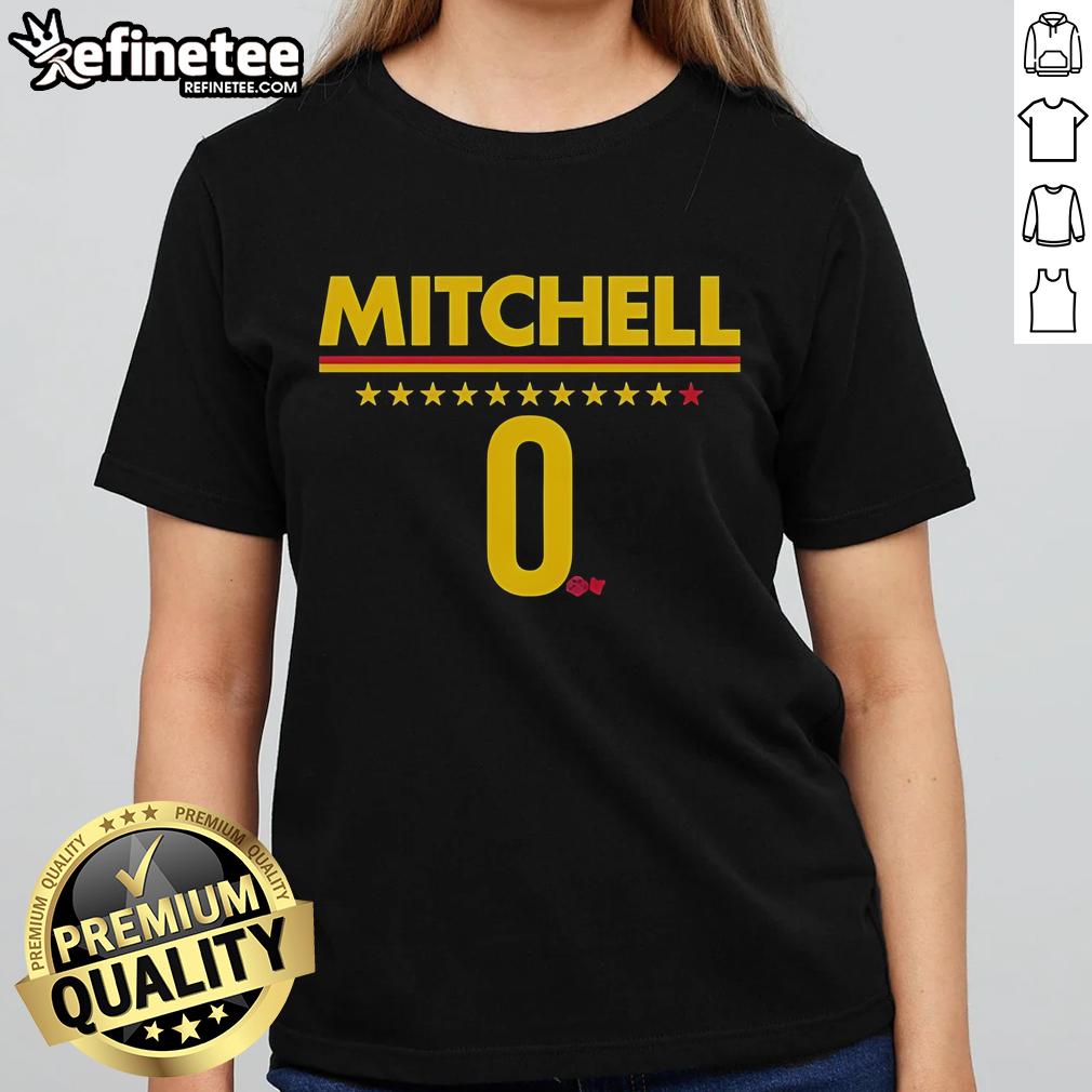 Alt Text: Kelsey Mitchell wearing a stylish Indiana Fever ladies tee, showcasing team spirit and fashion in vibrant colors.