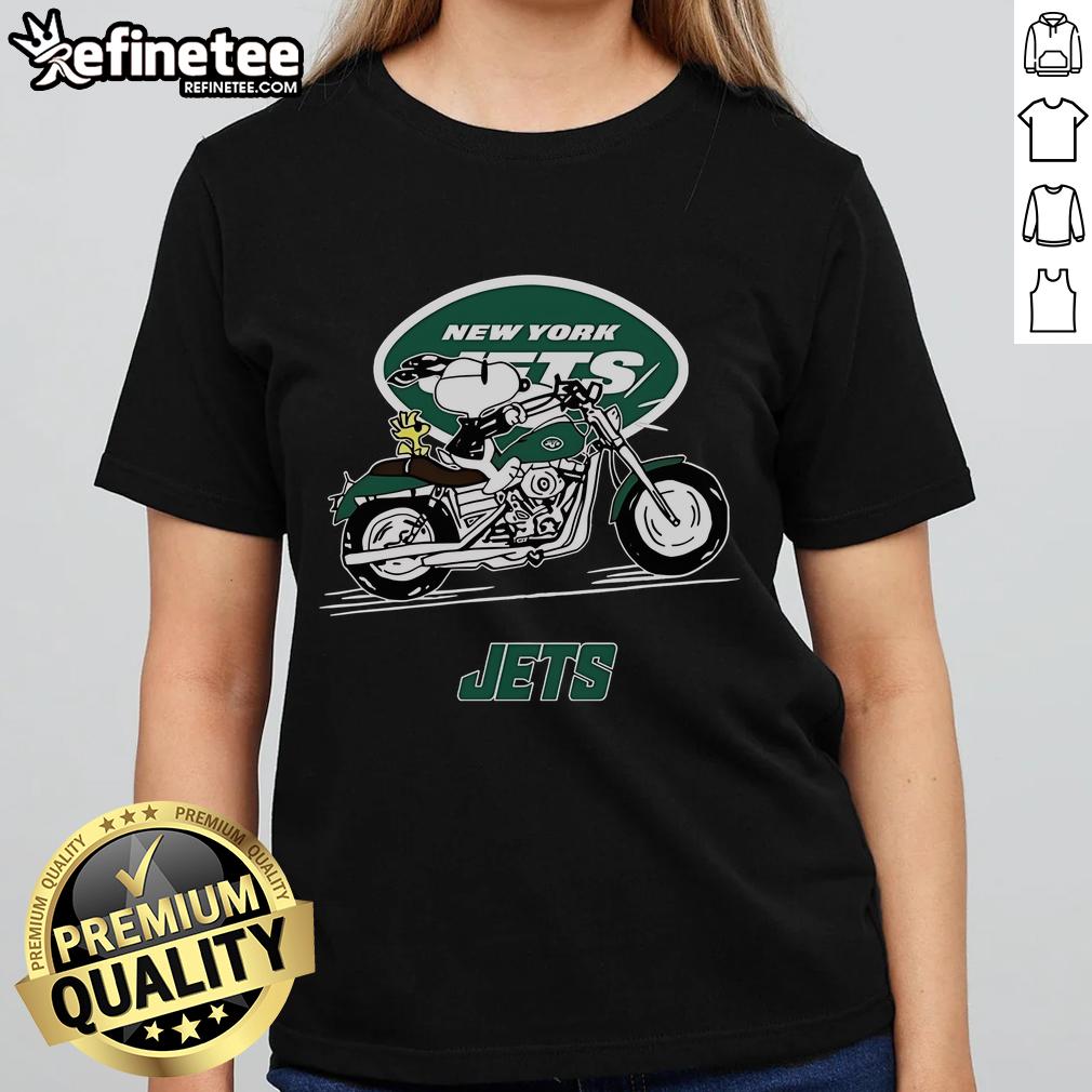 Snoopy and Woodstock riding a motorbike on a New York Jets ladies tee, perfect for fans of Peanuts and NFL.