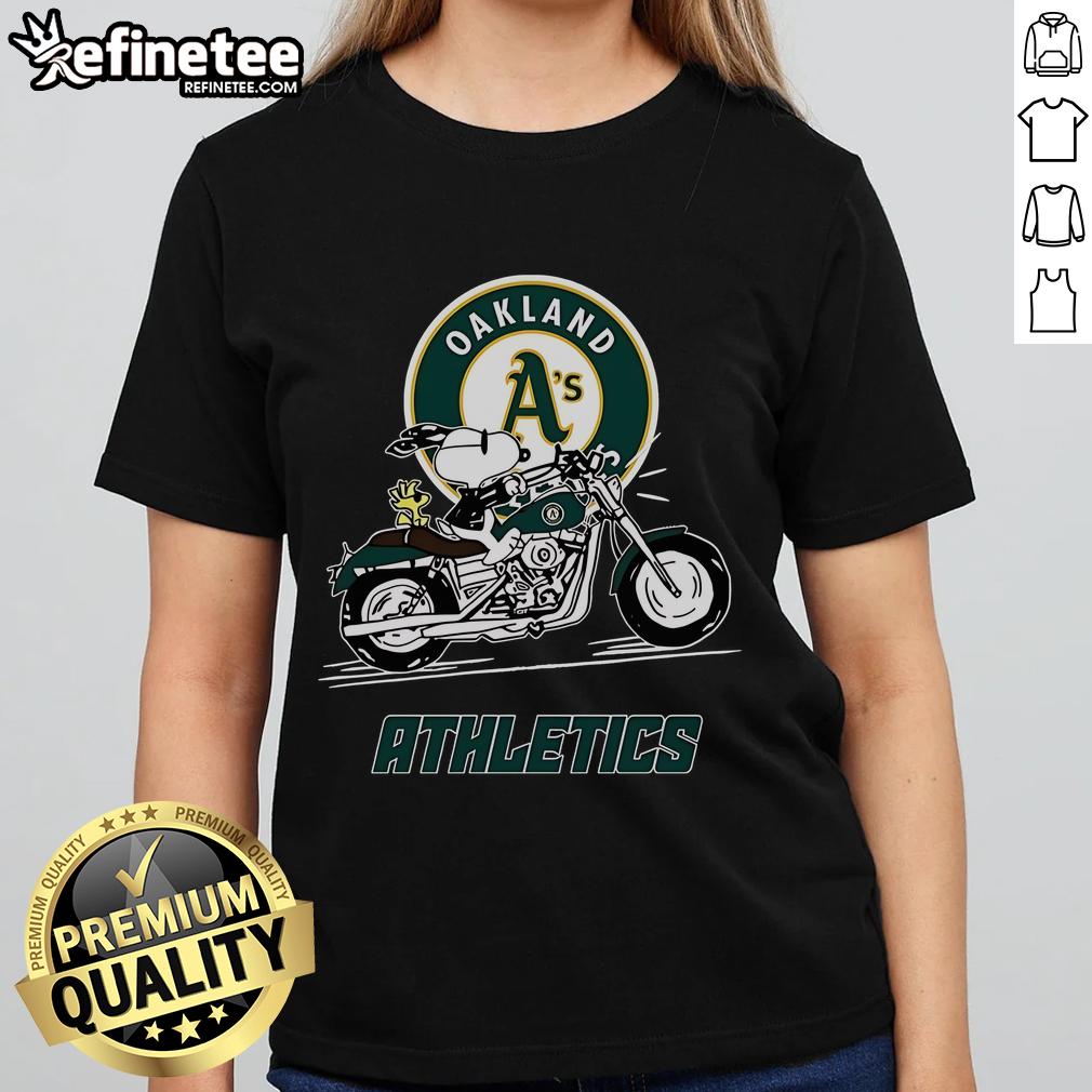 Cute Snoopy and Woodstock riding a motorbike on an Oakland Athletics ladies tee.