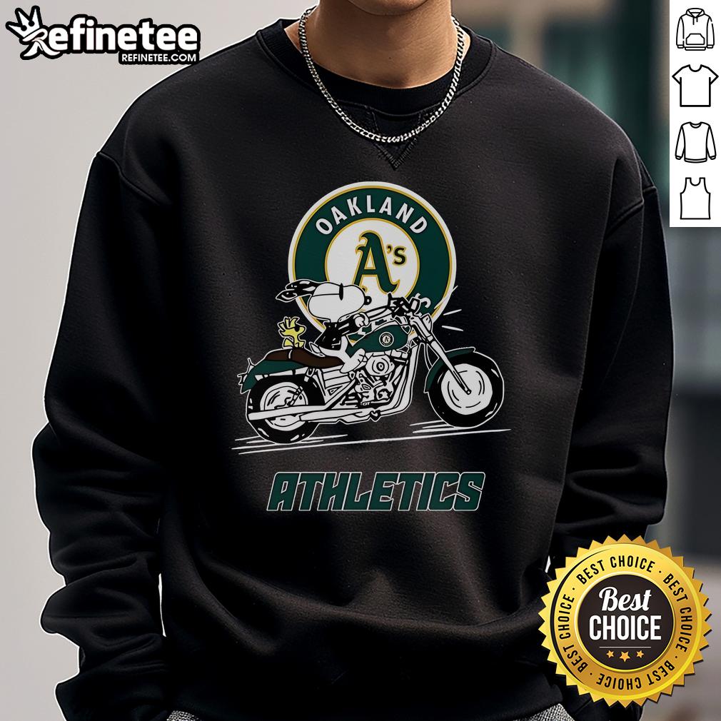 Alt Text: Snoopy and Woodstock riding a motorbike on an Oakland Athletics sweatshirt design.