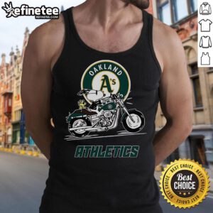 Alt Text: Snoopy and Woodstock riding a motorbike while wearing an Oakland Athletics tank top, showcasing playful adventure.