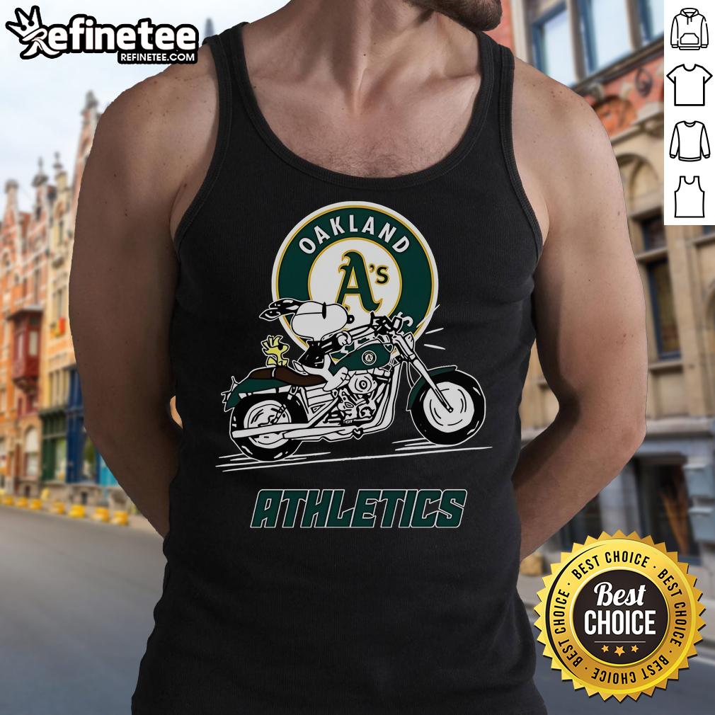 Alt Text: Snoopy and Woodstock riding a motorbike while wearing an Oakland Athletics tank top, showcasing playful adventure.