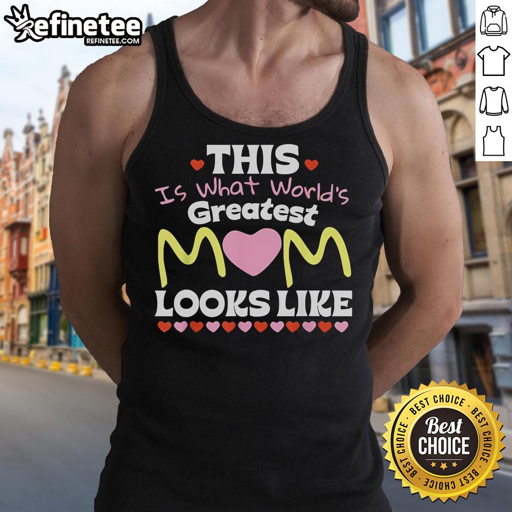 Mom wearing 'World's Greatest Mom' tank top, celebrating Mother's Day with a smile and joy.