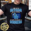 Official I May Live In Nevada But On Gameday My Heart And Soul Belongs To Dodgers T-Shirt in blue, featuring Dodgers logo.