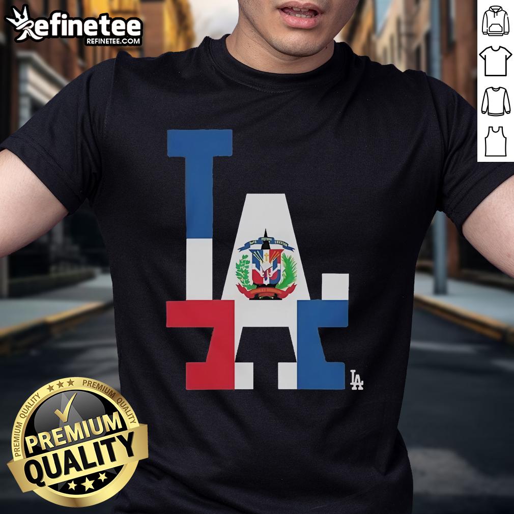 Alt Text: Official Los Angeles Dodgers Dominican Republic flag logo t-shirt featuring vibrant colors and a stylish design.