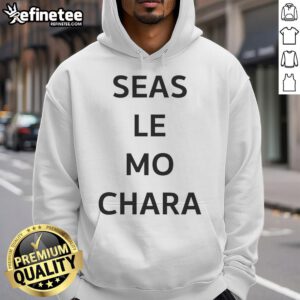 Alt Text: Premium Le Boom wearing Seas Le Mo Chara hoodie, showcasing stylish design and vibrant colors in a casual setting.