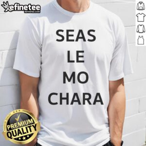Alt Text: Premium Le Boom models the Seas Le Mo Chara T-shirt, showcasing vibrant design and stylish fit for casual wear.