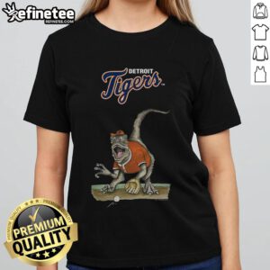 Official Detroit Tigers Tiny Turnip Velociraptor Ladies Tee featuring a fun dinosaur design and team colors.