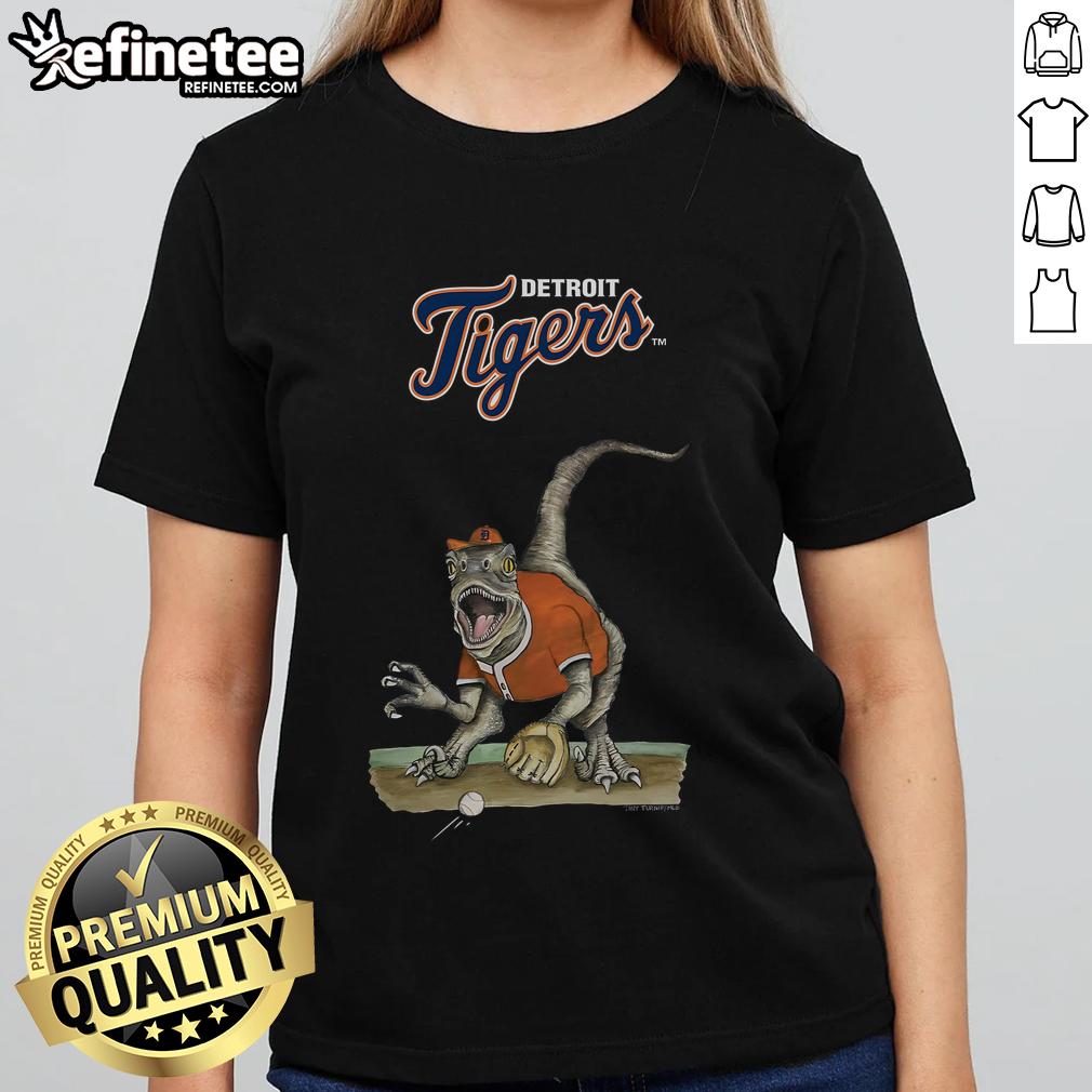 Official Detroit Tigers Tiny Turnip Velociraptor Ladies Tee featuring a fun dinosaur design and team colors.