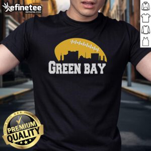 Alt Text: Official Green Bay City Skyline Football T-Shirt featuring a vibrant skyline design and team colors. Perfect for fans!