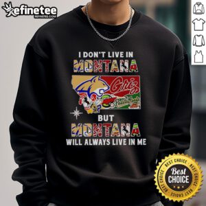 Alt Text: I Don't Live in Montana But Montana Will Always Live in Me sweatshirt featuring sport teams logo and cozy design.