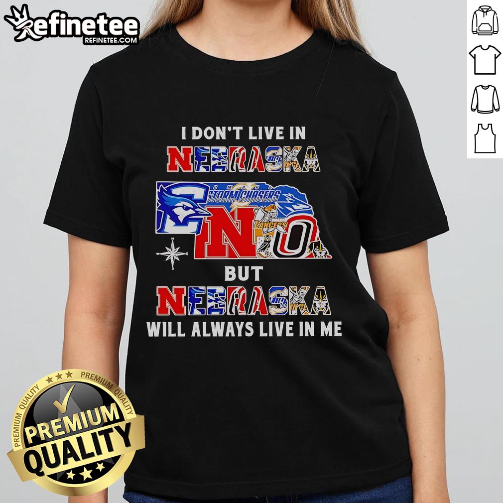 Official 'I Dont Live in Nebraska but Nebraska Will Always Live in Me' ladies tee featuring sport teams design.