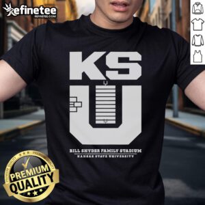 Alt Text: Official Kansas State Football Stadium KSU monogram t-shirt displayed on a hanger, featuring vibrant team colors and logo.