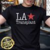 Official La Transplant T-Shirt featuring a bold graphic design and comfortable fit for fans and supporters.