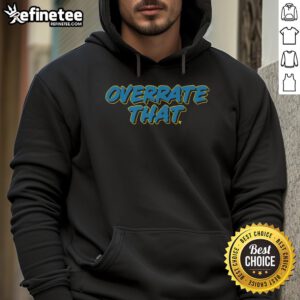 Alt Text: Pat McAfee wearing the 'Overrate That' hoodie, showcasing his unique style and personality in a casual setting.