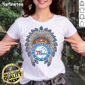 Official Philadelphia 76ers Native American Logo Ladies Tee showcasing vibrant team colors and unique design.
