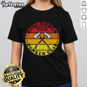 Real women in vintage Bunker gear with axes at sunset, showcasing the Awesome Real Women Wear Bunker Gear tee.