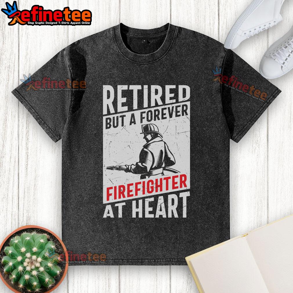 Awesome retired but a forever firefighter at heart washed t-shirt displayed on a rustic wooden background.