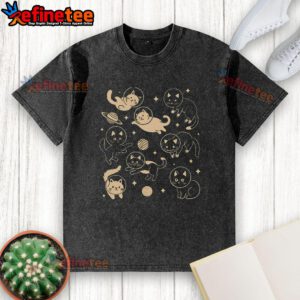 Alt Text: Cute astronaut cats in space on a washed t-shirt design, showcasing adorable astro feline graphics.