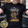 Alt Text: Nurse wearing a Jacksonville Jaguars T-shirt, showcasing her love for the team with a cheerful smile.
