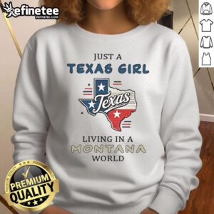 Happy Texas girl wearing 'Just A Texas Girl Living In A Montana World' sweatshirt, enjoying the scenic Montana landscape.
