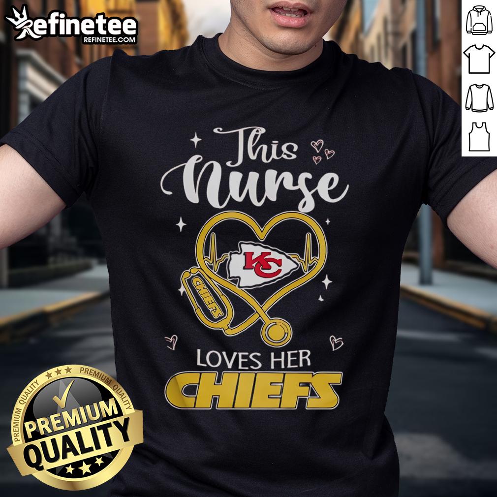 Happy nurse wearing a Kansas City Chiefs t-shirt, showcasing team spirit and love for football.