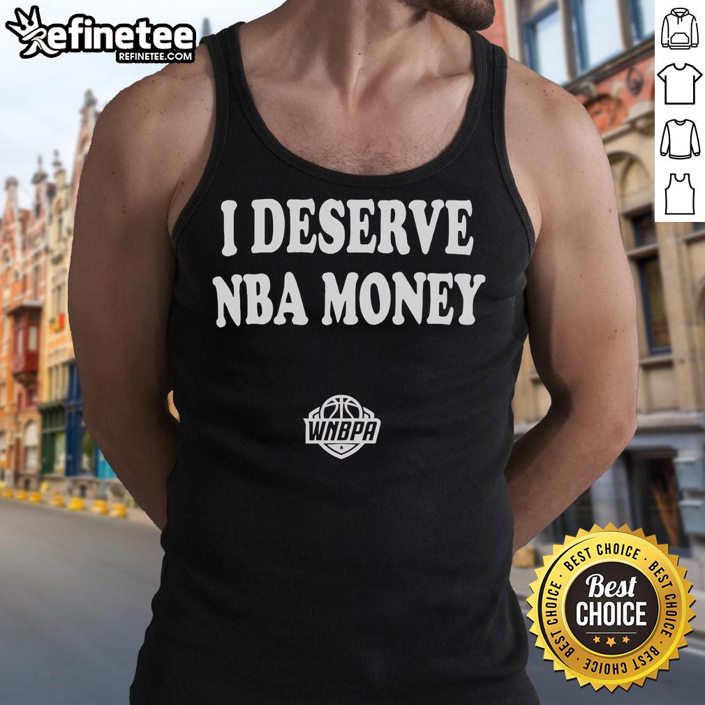 Alt Text: Caitlin Clark wearing a stylish tank top with I Deserve NBA Money slogan, promoting WNBA and women's sports.