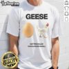 Unique 'Nice Geese Getting Killed I Should Burn In Hell' t-shirt design featuring playful graphics and bold text.