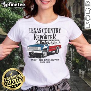 Texas country reporter shirt featuring an American flag car, celebrating back roads since 1972. Ideal for ladies.