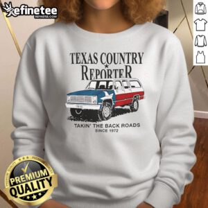 Texas country reporter sweatshirt featuring an American flag design, celebrating back roads since 1972.