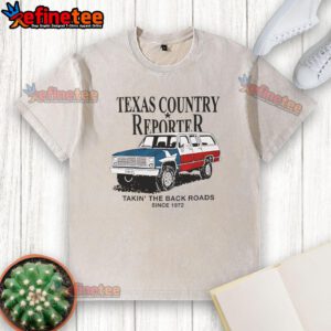 Alt Text: Nice Texas country reporter on back roads since 1972, featuring American flag car and washed T-shirt style.