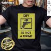 Alt Text: Official DIY Is Not A Crime T-Shirt featuring bold text design, perfect for crafting enthusiasts and advocates.