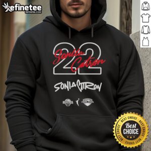 Georgia Amoore rocking the Sonia Citron 22 hoodie, showcasing style and team spirit in a vibrant sportswear setting.