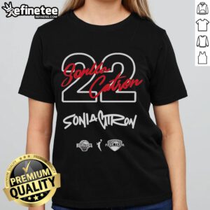 Official Georgia Amoore rocking the Sonia Citron '22 Ladies Tee in a stylish pose, showcasing vibrant team spirit.