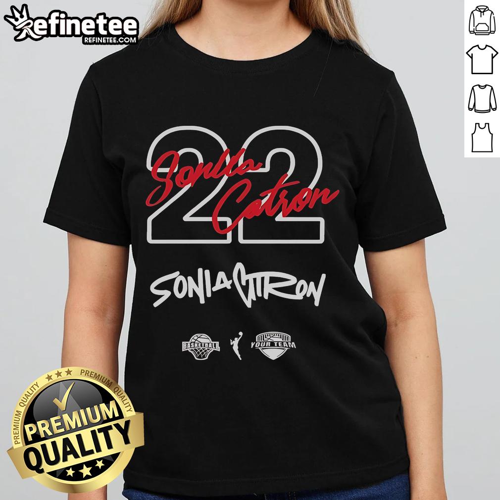 Official Georgia Amoore rocking the Sonia Citron '22 Ladies Tee in a stylish pose, showcasing vibrant team spirit.