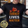 Funny Turkey Lives Matter Thanksgiving T-Shirt featuring a turkey protest graphic for holiday humor.