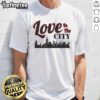 Alt Text: Happy Love In The City Skyline T-Shirt featuring a vibrant city skyline design and a joyful love theme.